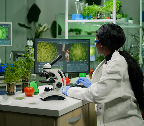 biologist-researcher-examining-organic-leaf 1